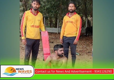 ಮುಳುಗುತ್ತಿದ್ದ ಪ್ರವಾಸಿಗನ ರಕ್ಷಿಸಿದ ಜೀವರಕ್ಷಕ ಸಿಬ್ಬಂದಿಗಳು